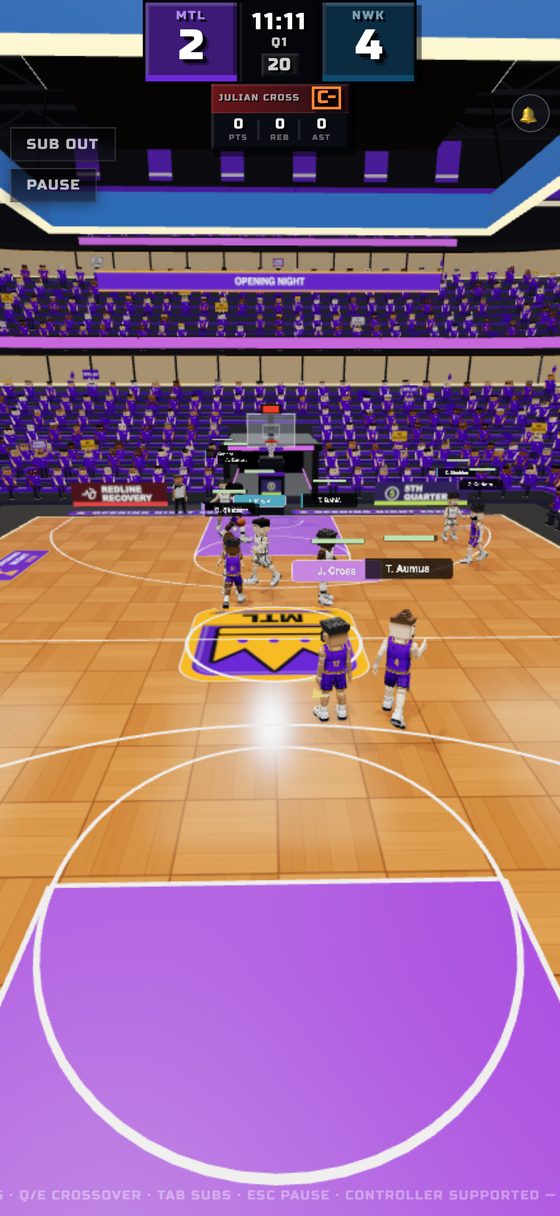A live possession on the 3D court, the scoreboard hanging over the arena